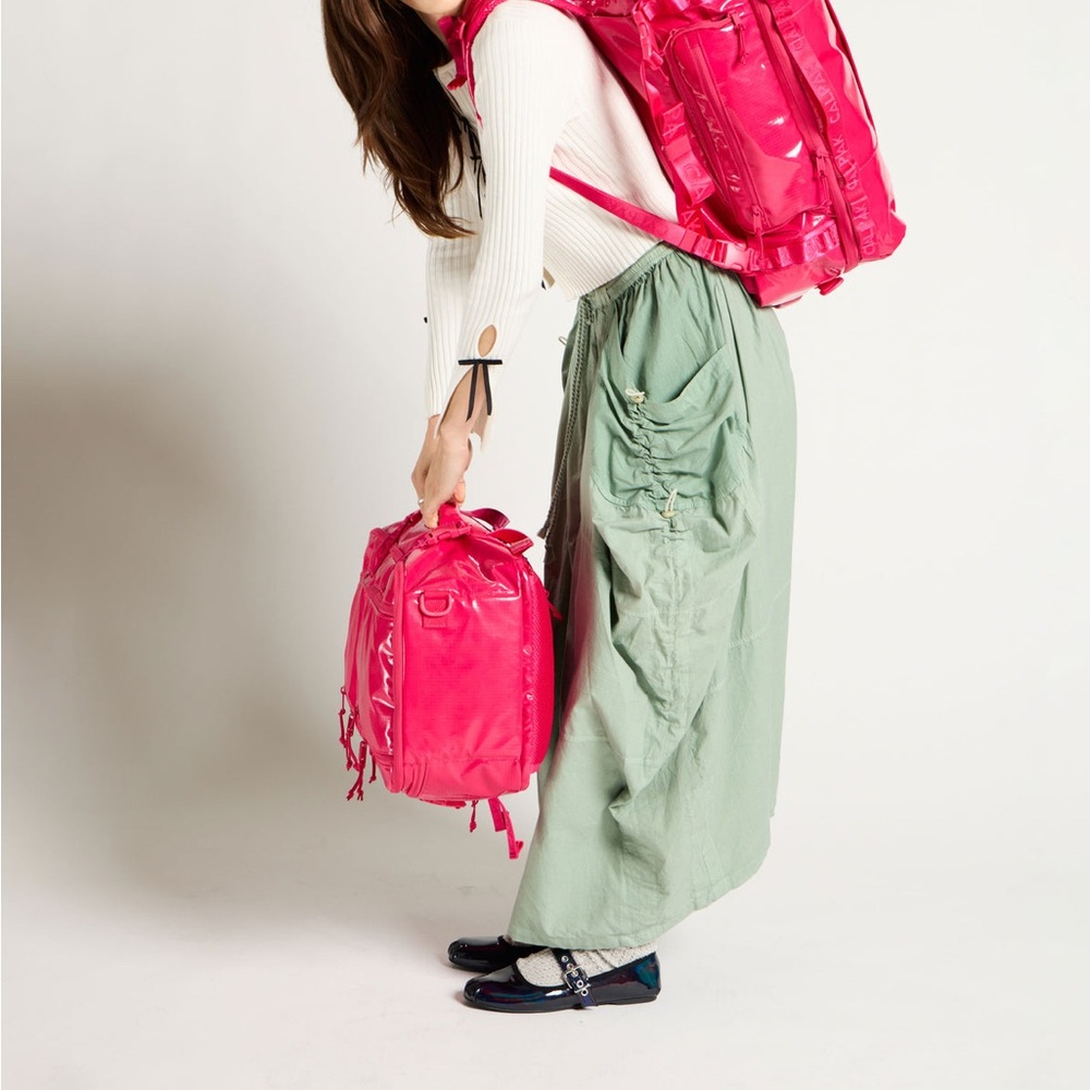 Calpak Terra Large 50L Duffel Backpack in Dragonfruit Pink